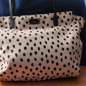 Kate Spade Black and Cream Spotted Tote. Spot in the zipper pocket on the bottom